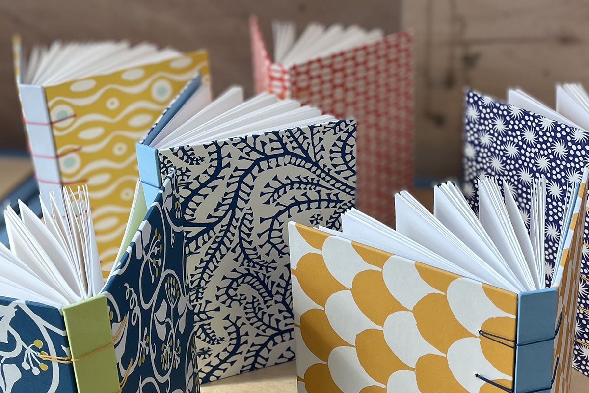 A collection of colourful handmade books